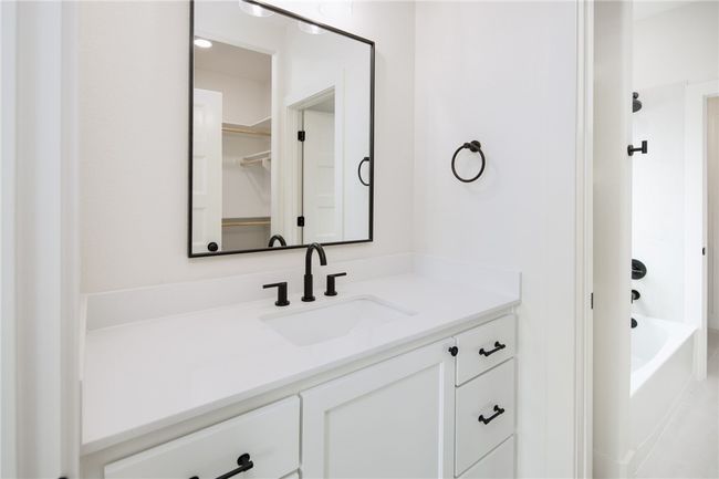 Full bath featuring vanity and shower combination | Image 24