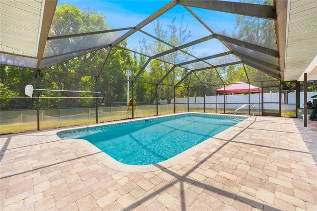 7660 Holiday Dr, House other with 4 bedrooms, 3 bathrooms and null parking in Spring Hill FL | Image 9