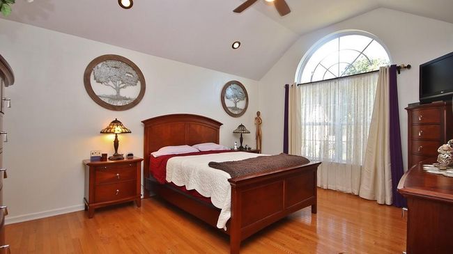 Primary bedroom with vaulted ceiling | Image 23