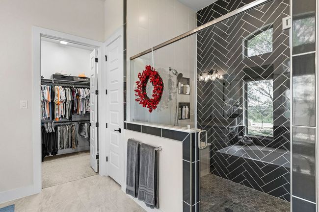 Full bath with a spacious closet and a tile shower | Image 27