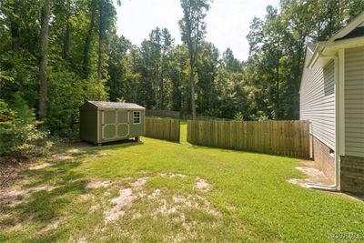 View of yard with a shed | Image 2