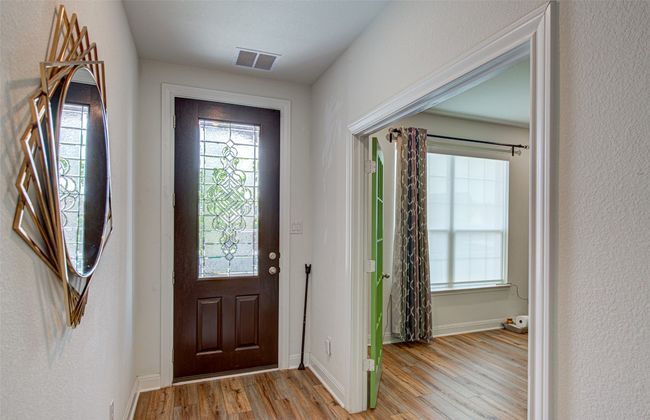Commercial Grade, Durable & Stylish Burbank Oaks Vinyl flooring installed on the entire first floor. | Image 4