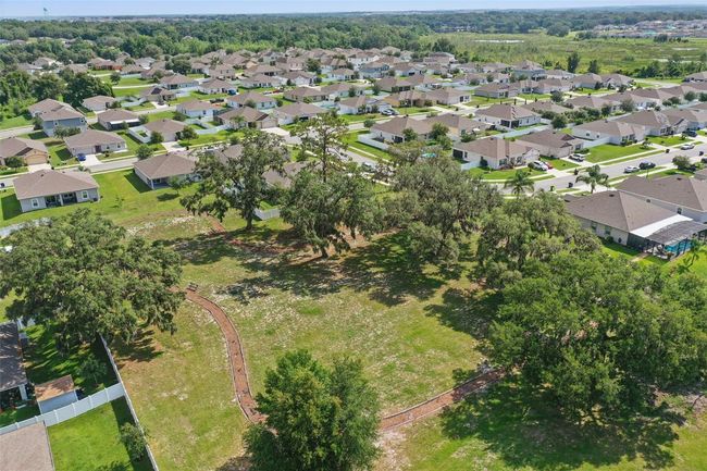 15250 Aquarius Way, House other with 3 bedrooms, 2 bathrooms and null parking in MASCOTTE FL | Image 43