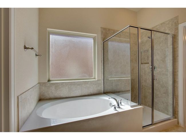 Primary Bathroom shower and bathtub | Image 19