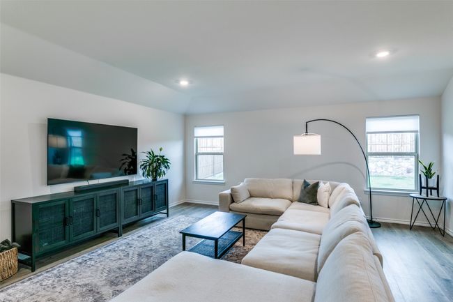 Living room with vaulted ceiling and hardwood / wood-style floors | Image 8