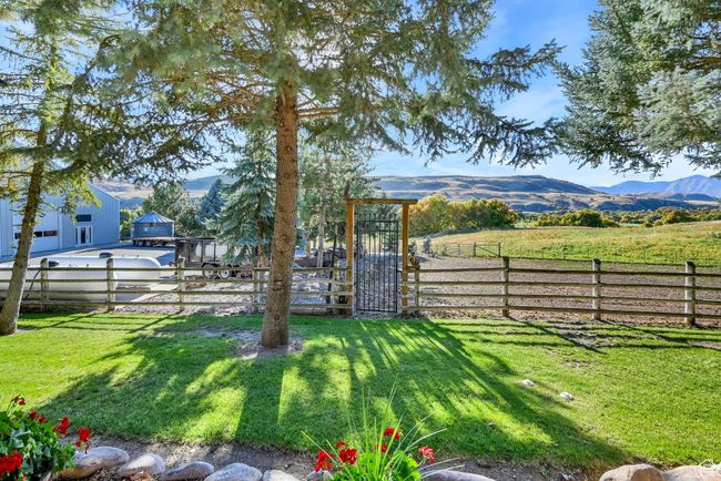 View of yard featuring a mountain view and a rural view | Image 33