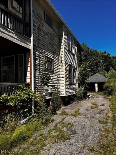 View of side of home with a balcony | Image 2