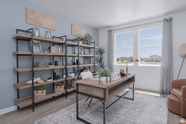 Office space with baseboards and wood finished floors | Image 30