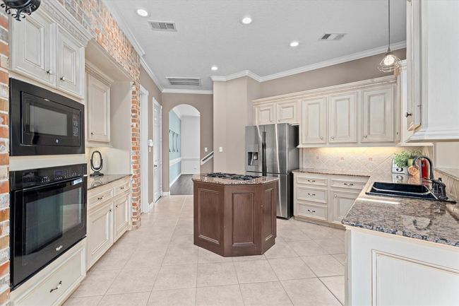 Gourmet kitchen with island | Image 14