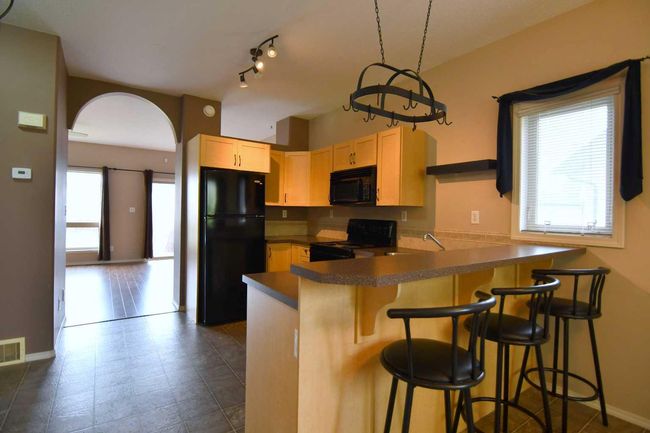 49 Prairie Ridge Close, Townhouse with 2 bedrooms, 2 bathrooms and 3 parking in Blackfalds AB | Image 13