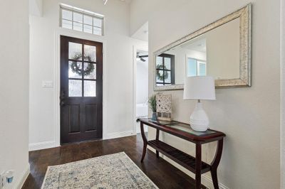 Beautiful light, bright, and airy entry featuring tall ceilings. | Image 3