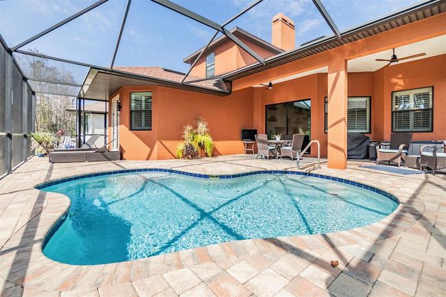 The screened in, and pavered lanai is a major upgrade | Image 22