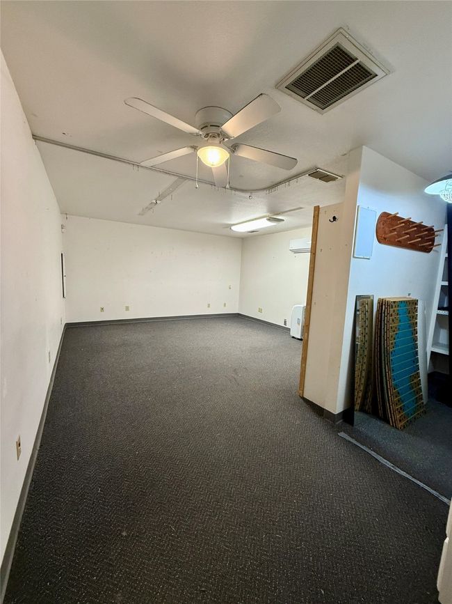Spare room featuring visible vents, baseboards, and a ceiling fan | Image 9