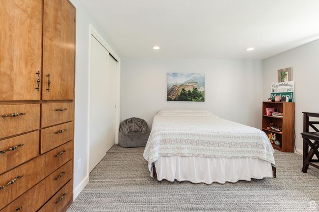 Bedroom with carpet, recessed lighting, and a closet | Image 27
