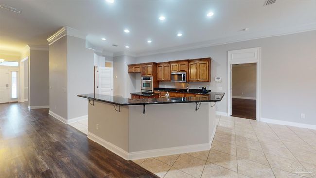 7445 Brevard St, House other with 4 bedrooms, 3 bathrooms and 6 parking in Navarre FL | Image 6