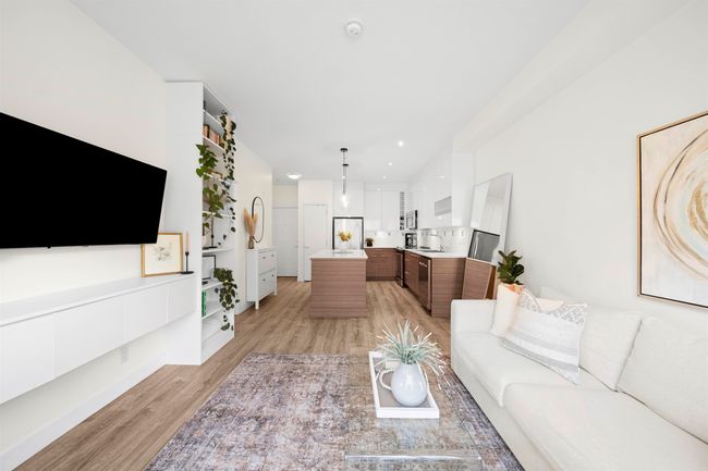 Living room featuring light wood-style flooring | Image 6