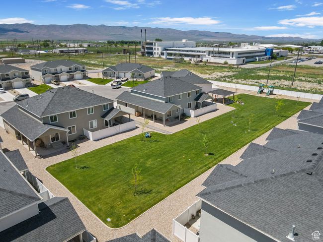 Aerial perspective of suburban area with a mountainous background | Image 31