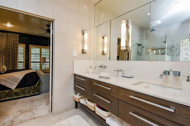Wonderful double sinks, with below cabinet storage. | Image 28