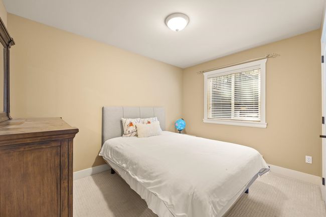 Bedroom featuring baseboards and carpet flooring | Image 25