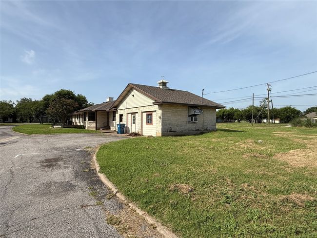 Corner lot. Side and rear view of property. | Image 14