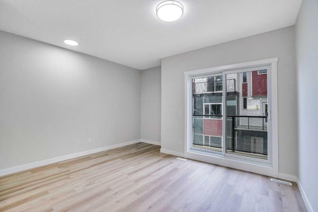 306 Red Sky Villas Ne, Townhouse with 3 bedrooms, 4 bathrooms and 1 parking in Calgary AB | Image 16