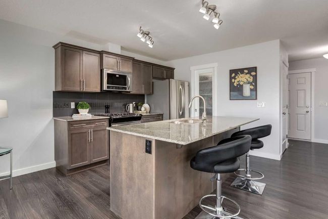 251 Kingsbridge Rd Se, Home with 2 bedrooms, 3 bathrooms and 2 parking in Airdrie AB | Image 6