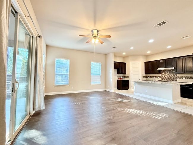 Unfurnished living room featuring recessed lighting, a ceiling fan, and light wood finished floors | Image 8