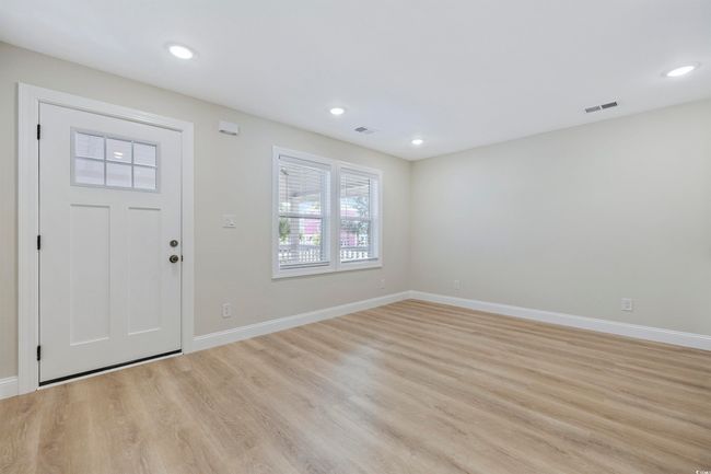 Foyer with light wood finished floors, baseboards, and recessed lighting | Image 11