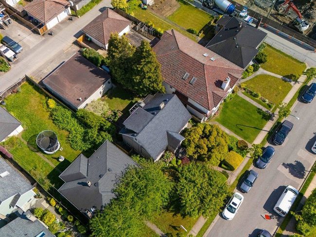 Aerial overview of property's location with nearby suburban area | Image 36