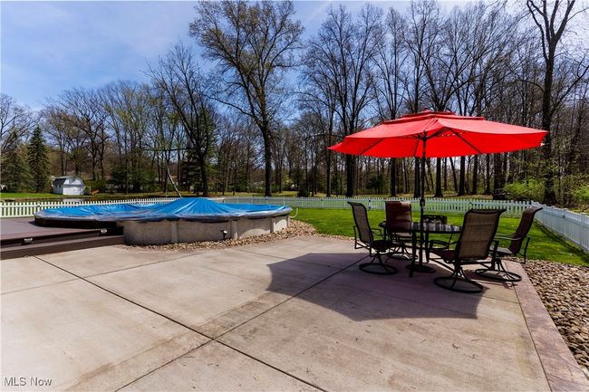 View of patio and partial in ground pool | Image 39