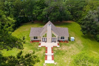 27915 Debbie Road, House other with 3 bedrooms, 2 bathrooms and null parking in Okahumpka FL | Image 2