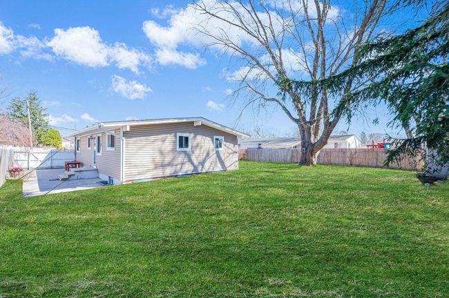 View of patio / terrace featuring a fenced backyard | Image 24
