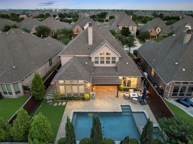 Drone view of the backyard oasis at sunset. Tranquil and relaxing for those Texas evenings. | Image 35