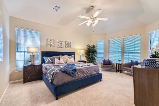 Spacious Primary bedroom with bow bayed sitting area | Image 17