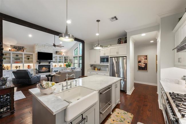 Kitchen open to the formal living room | Image 5