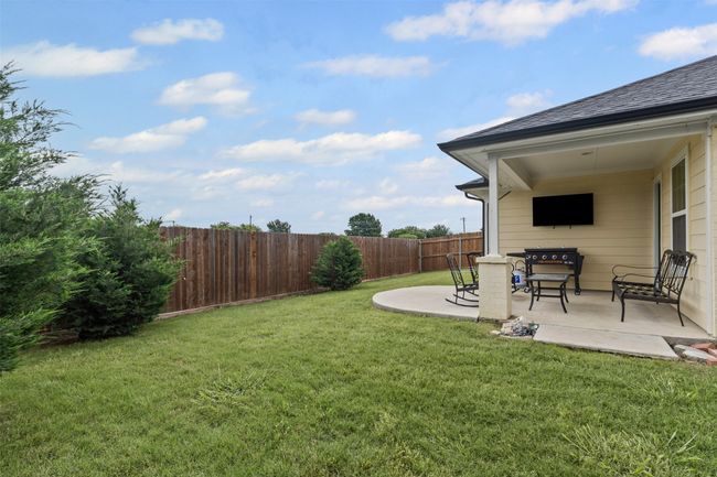 View of yard featuring a patio area | Image 23
