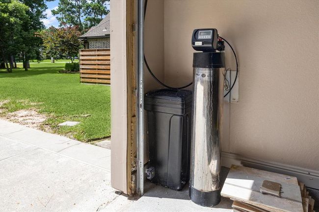 Third Car Garage Has A Whole Home Water Softener | Image 47