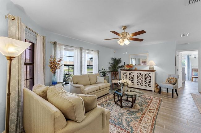 Living room is filled with light and is perfect for entertaining | Image 5