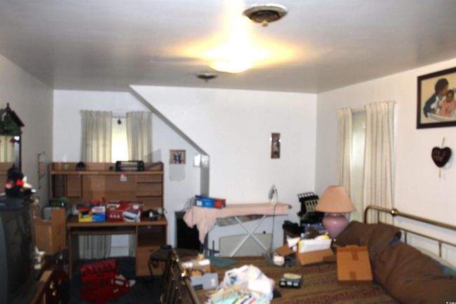 View of living area | Image 18