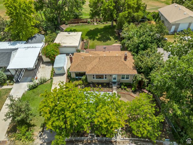 Aerial view of property and surrounding area with a tree filled landscape | Image 41