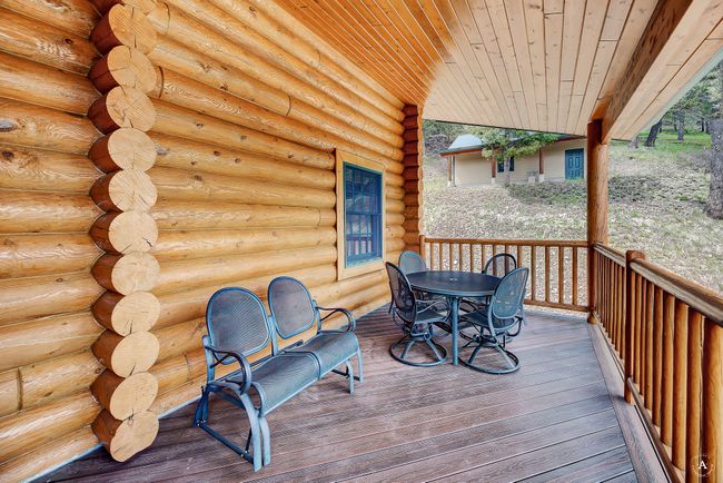 Deck with outdoor dining area | Image 38