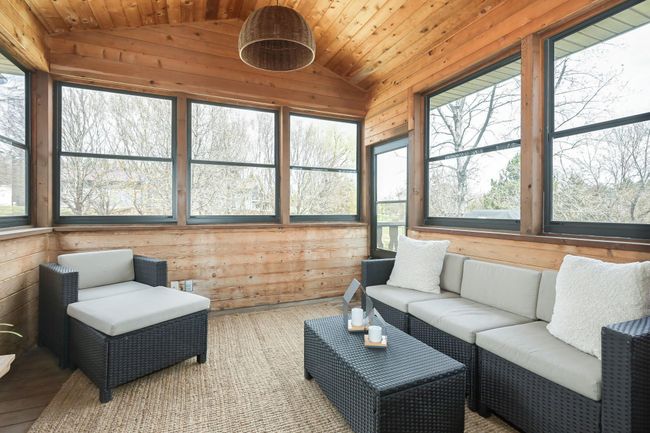 Three season porch has wonderful access to the yard or grilling deck | Image 20