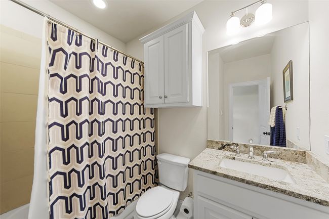 Third Bathroom located on other side of home conveniently close to fourth bedroom and kitchen area. | Image 27