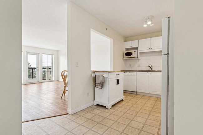 1314 - 928 Arbour Lake Rd Nw, Condo with 2 bedrooms, 2 bathrooms and 1 parking in Calgary AB | Image 4