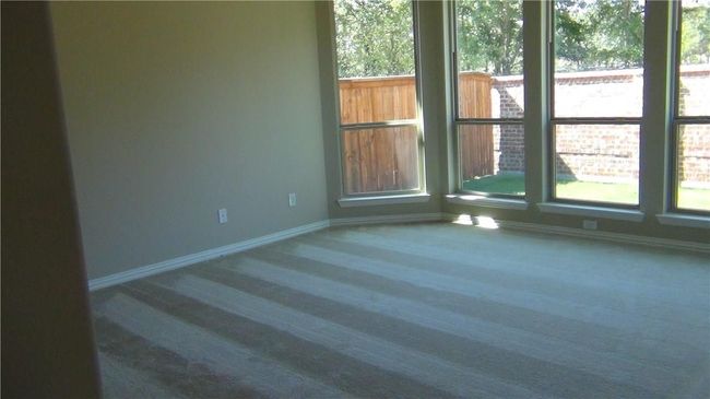 Unfurnished room with baseboards | Image 9