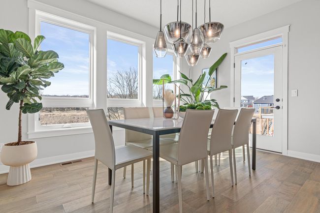 Dining room with access to future deck | Image 7