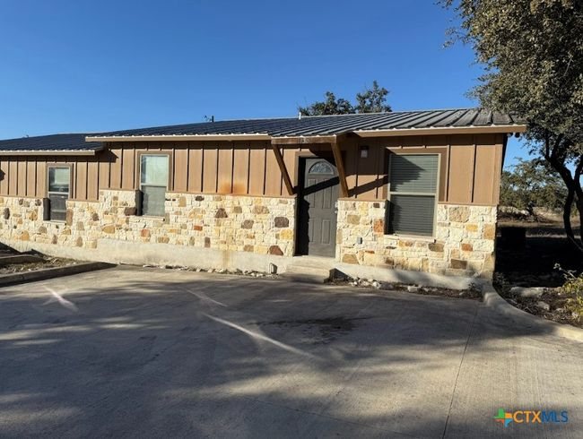 Each apartment has own entrance and back patio. Another view of apartment community. | Image 6