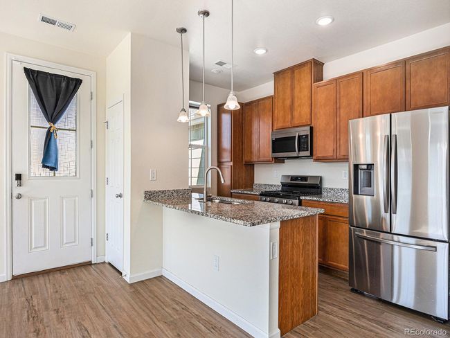 E - 5755 S Buchanan Ct, House attached with 2 bedrooms, 1 bathrooms and null parking in Aurora CO | Image 11