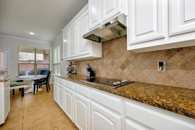 Drop in Cooktop and Built-in Oven modernize this kithcen | Image 16