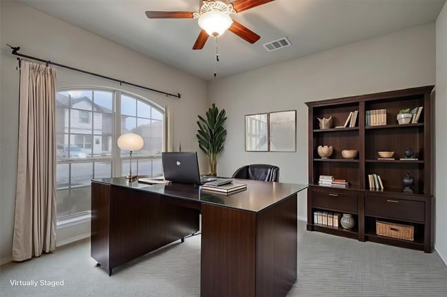 Home office featuring ceiling fan and light colored carpet | Image 14